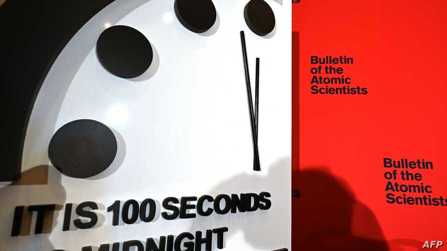 The Doomsday Clock reads 100 seconds to midnight, a decision made by The Bulletin of Atomic Scientists, during an announcement at the National Press Club in Washington, DC on January 23, 2020. - President and CEO of the non-profit group Rachel Bronson said "It is the closest to Doomsday we have ever been in the history of the Doomsday Clock." The clock was created in 1947. (Photo by EVA HAMBACH / AFP)