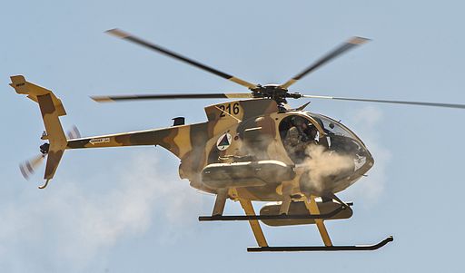 Afghan Air Force MD-530F helicopter fires machine guns