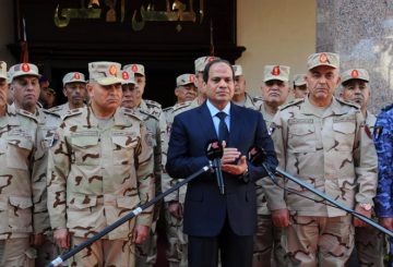 A handout picture released by the Middle East News Agency (MENA) shows Egyptian President Abdel Fattah el-Sisi (C), surrounded by top military generals, as he addresses journalists following an emergency meeting of the Supreme Council of the armed Forces in Cairo on January 31, 2015. Sisi said the battle against jihadist insurgents in the Sinai Peninsula would be a long and hard one, as violence there continues unabated. AFP PHOTO / MENA / HO == RESTRICTED TO EDITORIAL USE - MANDATORY CREDIT "AFP PHOTO / HO / MENA" - NO MARKETING NO ADVERTISING CAMPAIGNS - DISTRIBUTED AS A SERVICE TO CLIENTS == (Photo by MENA / MENA / AFP)