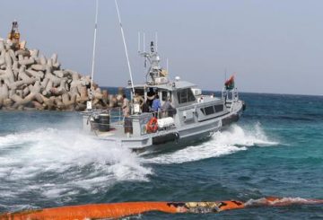 Members of Libya's naval coastguard man a speed boat as they wait for the arrival of the Morning Glory, an oil tanker that US Navy handed over to Libyan authorities at Zawiya port in Zawiya, Libya, 22 March 2014. ANSA/SABRI ELMHEDWI