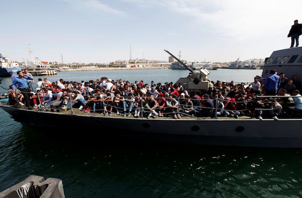 Illegal migrants arrive by boat at a naval base after they were rescued by Libyan coastguard in the coastal city of Tripoli, Libya, May 10, 2017. REUTERS/Ismail Zitouny TPX IMAGES OF THE DAY - RTS161IK