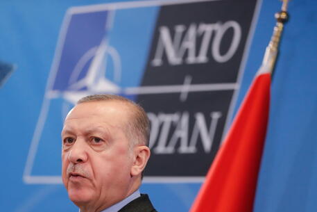 epa09847068 Turkish President Recep Tayyip Erdogan gives a press conference at the end of a Group of Seven (G7) Leaders meeting at the Alliance headquarters in Brussels, Belgium, 24 March 2022. EPA/STEPHANIE LECOCQ