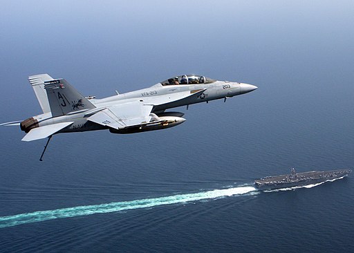 F-A 18 Super Hornet, over USS Theodore Roosevelt (CVN 71)