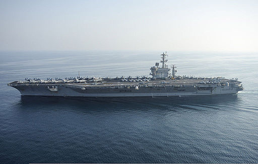 The aircraft carrier USS Nimitz (CVN 68) travels in the Persian Gulf Aug. 13, 2013 130813-N-IB033-166
